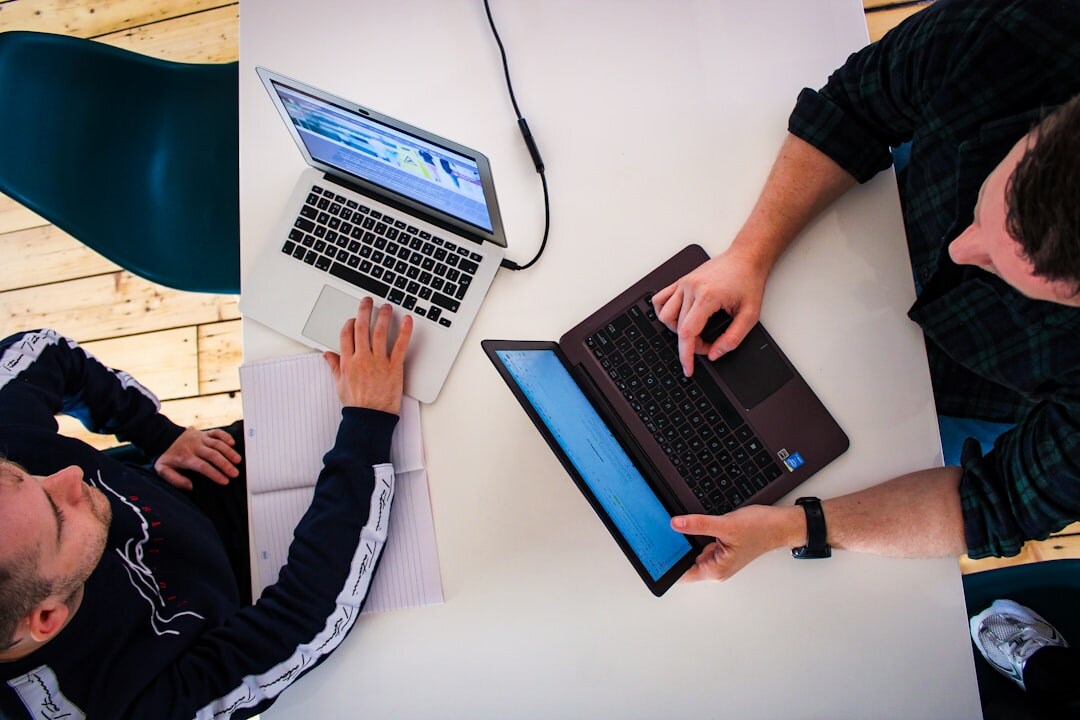 students coding together