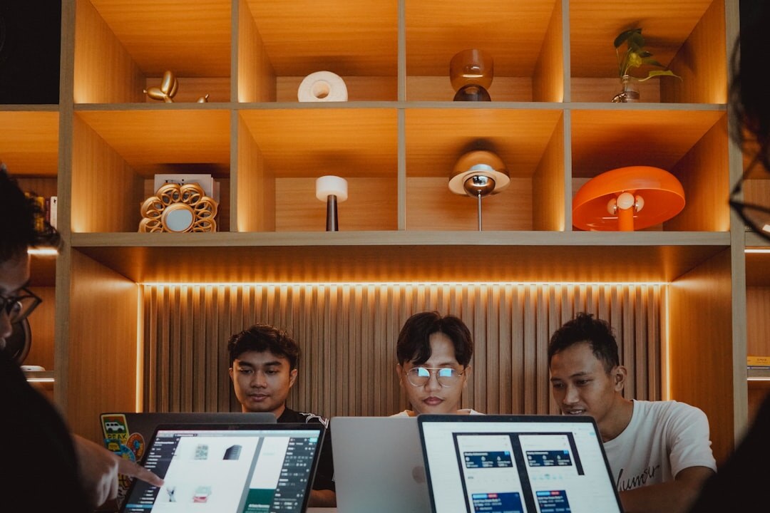 Video production team reviewing footage on monitors in a modern studio